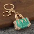 Luxury rhinestone handbag keychain, gold metal drop oil key ring backpack pendant charm. - KC Gold + Green