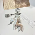 Cute flocked deer keychain with lace ribbon and pearl beads, perfect bag charm accessory. - Blue Deer