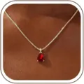 Elegante collar con colgante de circón rojo pera chapado en oro con cadena de caja clásica. - 14k / Enero - Dorado