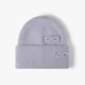 Close-up detail of the knit beanie showing soft rabbit hair texture and cute side bow. - One Size (55-60) / Taro Purple