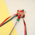 Varita de juguete para gatos de Navidad con cabeza de reno de peluche, cintas y cascabeles. - Estilo Alce