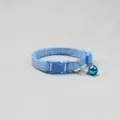 Blue plaid pet collar detail featuring soft woven fabric, safety buckle, and a cute blue bell. - Sky Blue