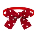 Close-up of red pet bow tie with white hearts, ideal for dog and cat grooming accessories. - Red White Heart