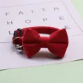 Red suede cat collar with bow tie and bell, adjustable velvet pet neck strap for small dogs. - Red