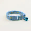 Cute blue pet collar for cats and dogs, adjustable nylon neck strap with cartoon print and bell. - Sky Blue
