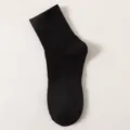 Close-up detail shot of the black ribbed mid-tube sock, showing fine knitting and texture. - Crew Socks / 13cm / Black