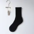 Black ribbed mid-calf cotton sock variant, comfortable autumn and winter daily wear basic style. - Thickened Cushioned Crew Socks / Black