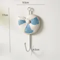 Gancio da parete a forma di conchiglia mediterranea, appendiabiti decorativo bianco e blu. - Gancio Conchiglia Blu e Bianco