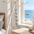 Decorazione murale sospesa con conchiglie blu e bianche stile marino, 51 cm, 140g. - Stile Conchiglia