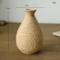 Minimalistische rohe Holzvase mit Blattrelief, ideal für Trockenblumen und Heimdekoration. - Minenflasche Blatt Rohling