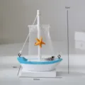 Modello di barca a vela in legno mediterraneo decorazione scrivania con rete e stella 15cm. - Base Rete Bianca Barca Chiara con Stella Marina Stile
