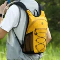 Yellow lightweight outdoor hydration backpack, portable sports hiking climbing daypack variant. - Yellow