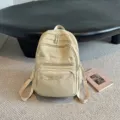 Zaino casual beige con tasche multiple, elegante borsa scolastica per donne e studenti. - Bianco avorio