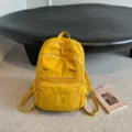 Zaino casual giallo da donna con tasche multiple, perfetto borsone scolastico per viaggi. - Giallo