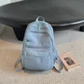 Zaino casual multifunzione da donna in azzurro chiaro, ideale per la scuola, viaggi e tempo libero. - Blu
