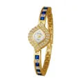 Gold women's quartz watch featuring a rhombus diamond dial and blue crystal accented metal bracelet. - Gold Blue