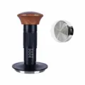 Detail closeup of adjustable coffee tamper featuring wooden handle and threaded base. - 58mm Threaded Base