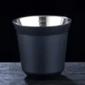 Double wall stainless steel cup detail, black matte exterior, polished interior metal. - 51-100ML / Black