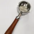 Replacement coffee bottomless portafilter with ergonomic wooden handle for espresso machines. - 58mm 2-Ear Alloy Welhome Handle