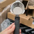 Replacement coffee bottomless portafilter with filter basket and ergonomic handle for home use. - 51mm Zinc Alloy Handle