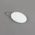 Porte-monnaie ovale en silicone blanc et étui pour écouteurs avec porte-clés portable. - Blanc