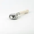 Close-up detail view of 58mm stainless steel bottomless coffee portafilter for espresso machine. - ABS White Handle