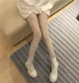 White floral lace fishnet pantyhose for women, retro Lolita style sheer leg tights detailed view. - Bottoms / 1 Pair Pack / White