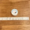 Detailansicht der niedlichen Urlaubs Washi Tape Rolle und dekorativen Planer Sticker Streifen. - Washi Arbeitsplatz Gedämpftes Brötchen Volle Rolle 5m