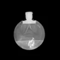 Gros plan sur la poche cosmétique ronde transparente, design de sac de voyage pour lotion. - Pack de 50ml / Blanc