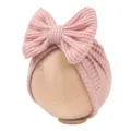 Newborn pink knitted bow turban hat detail, cute infant beanie with large bow accent. - Pink