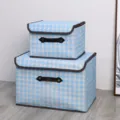Blue houndstooth foldable storage box with lid and handle, ideal for home wardrobe organization. - Sky Blue Houndstooth (Leather Handle)