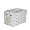 Panier de rangement en tissu avec motif géométrique et poignées en corde pour la maison. - Blanc
