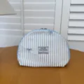 Blue striped cosmetic bag with bow embroidery, portable shell-shaped fabric makeup storage pouch. - Blue Stripe 01 Shell Bag