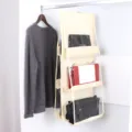 Hängender Handtaschenorganizer mit klaren transparenten Fächern für den Kleiderschrank. - Gebrochenes Weiß