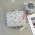 Floral makeup pouch, cream fabric cosmetic bag with pink tassel, portable zipper coin purse. - Pink and Blue Floral