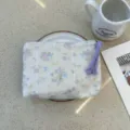 Fresh floral print storage pouch, portable cosmetic bag and zipper organizer for women. - Purple Fluff Fragrance