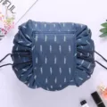 Waterproof lazy drawstring makeup bag with leaf pattern, portable cosmetic pouch for travel. - Feather