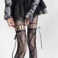 Sexy black lace fishnet pantyhose with ribbon bow and ripped hollow-out design for women. - Black