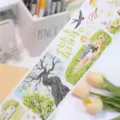 Decoratieve washi-tape met schattige lente-picknickillustraties, ideaal voor journaling en knutselen. - Washi Speciale Olie - Lentereis Monster