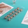 Clip per sciarpa magnetiche a stella dorata, bottoni anti-abbagliamento per foulard donna. - Confezione da 12 / Oro rosa