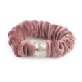 Close up detail of dusty pink velvet hair scrunchie with sparkling glitter bead accent. - Pink