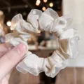 Sweet lace ruffled hair scrunchie soft elastic ponytail holder elegant hair accessory detail view - Nude