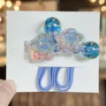 Glitter flower design hair ties detail view, cute kids colorful elastic ponytail rubber bands. - Blue