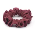 Close-up of wine red honeycomb ice silk hair scrunchie, detailed textured fabric texture. - Raspberry Red