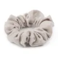 Soft wool blend fabric scrunchie detail view, elegant beige hair accessory for daily styles. - Oatmeal