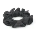 Detailed view of a black honeycomb ice silk hair scrunchie showing fine fabric texture. - Dark Gray