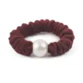 Close-up detail view of the dark red wool scrunchie featuring a large central pearl bead. - Dark Red