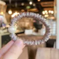 Satin pearl hair scrunchie elastic hair tie elegant ponytail holder for women daily wear - S / Champagne