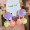 Detalle de coletero de cuentas facetadas de colores, bonito accesorio para el pelo de niños. - Púrpura