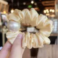 Elegant satin hair scrunchie with large white faux pearl, chic ponytail holder for women. - L / Nude